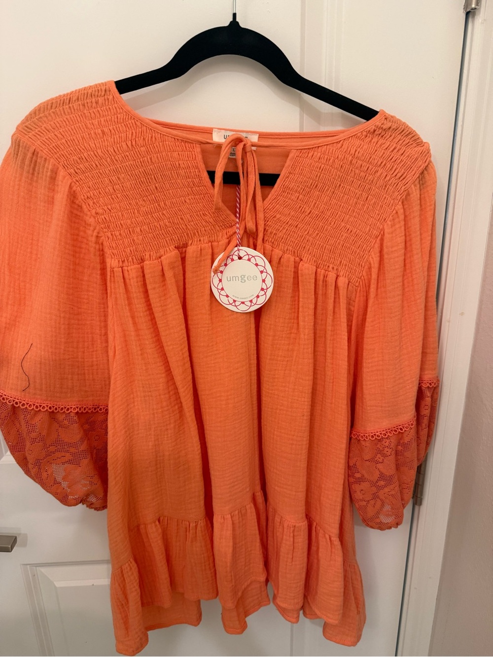 Umgee Orange Smocked Yoke Tiered Top with Lace Sleeves